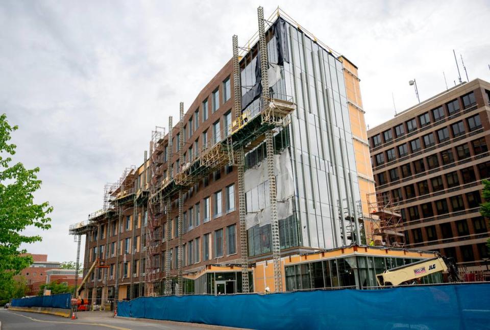 Construction crews work on the Susan Welch Liberal Arts Building on Fischer Road on the Penn State campus on Thursday, May 9, 2024.