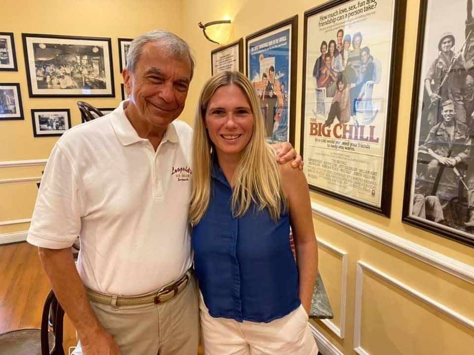 Stratton Leopold and Melanie Bowden Simón smiling together. Leopold is the executive producer of the "La Americana" film adaptation.