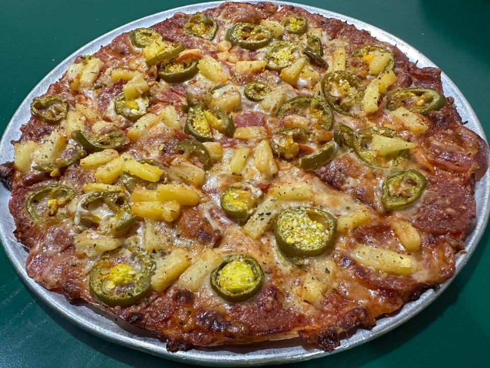 imo's st. louis style pizza with pineapple and jalapenos