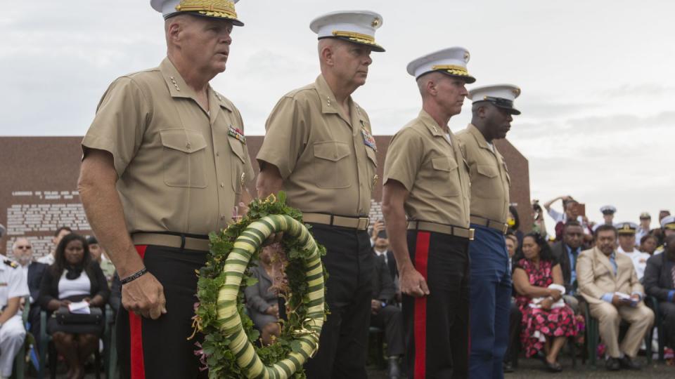Then-Maj. Gen. Eric Smith (third from left) stands with Gen. Robert Neller, then-Lt. Gen. David Berger, and Sgt. Maj. Ronald Green during the 75th anniversary commemoration of the landing of Marines on Guadalcanal. (Cpl. Samantha Braun/Marine Corps)