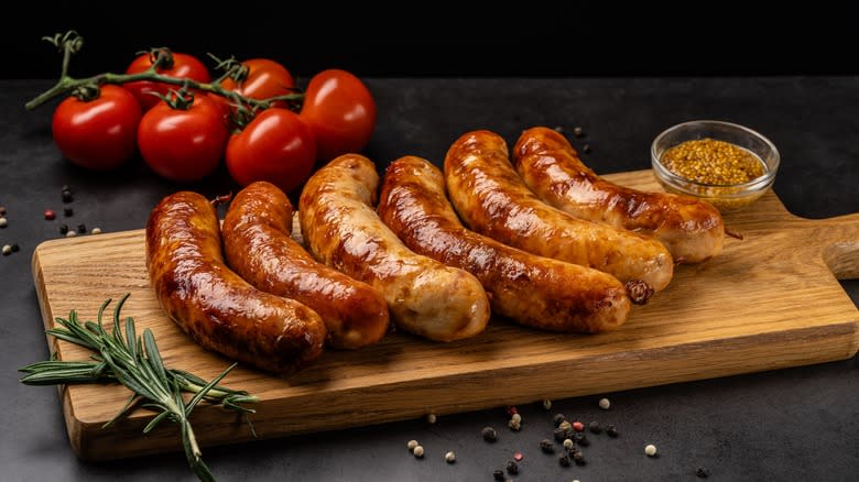 Pork sausage on cutting board