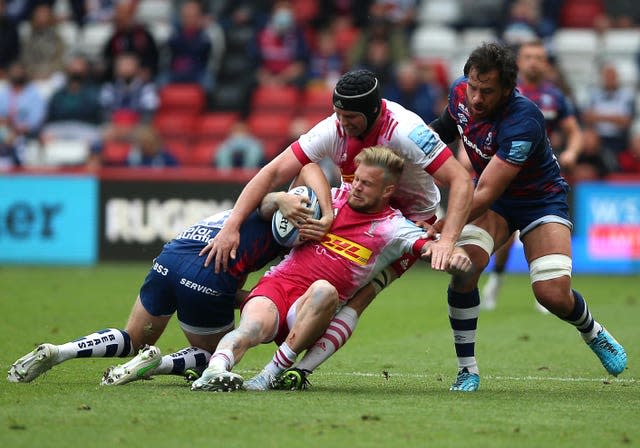 Tyrone Green clings on to the ball