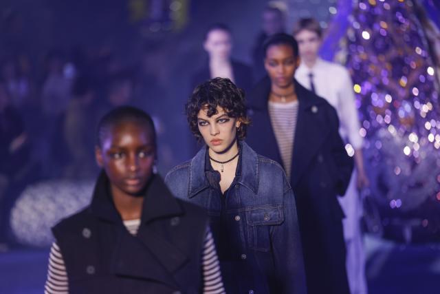 Models wear creations as part of the Christian Dior Fall/Winter 2023-2024 ready-to-wear collection presented Tuesday, Feb. 28, 2023 in Paris. (Vianney Le Caer/Invision/AP)