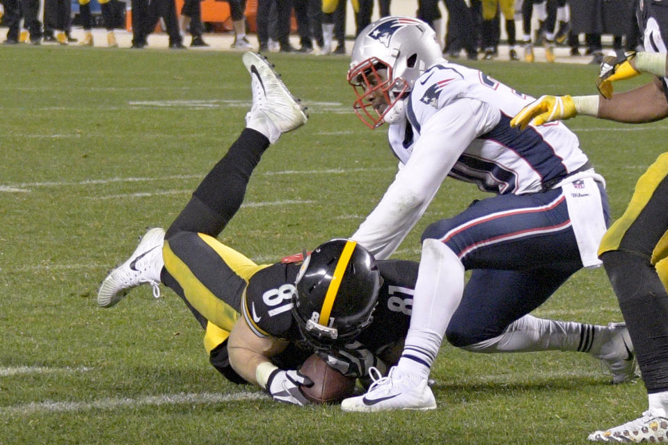 Pittsburgh Steelers tight end Jesse James' catch against the Patriots was reversed, and that led to a rule change. (AP)