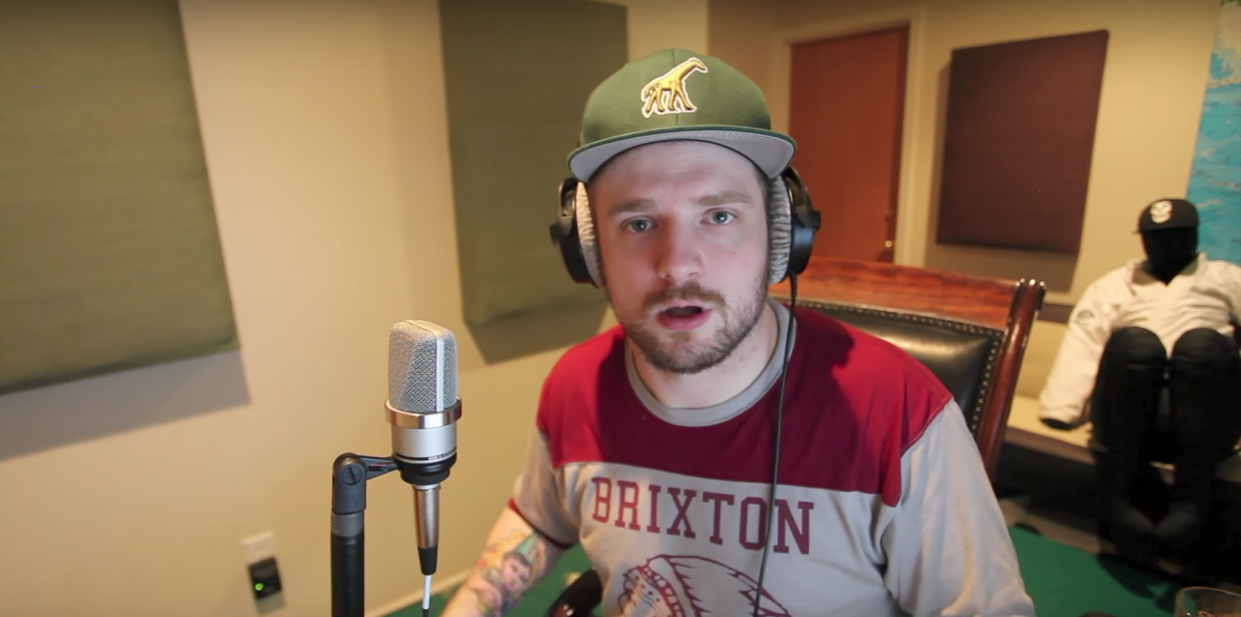 Rapper David McCleary Sheldon, known as Mac Lethal, in his studio. Video still from YouTube