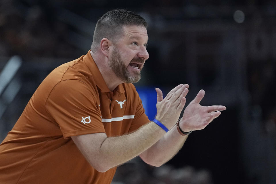 Texas head coach Chris Beard talks to his players during the first half of an NCAA college basketball game against Arkansas-Pine Bluff in Austin, Texas, Saturday, Dec. 10, 2022. (AP Photo/Eric Gay)