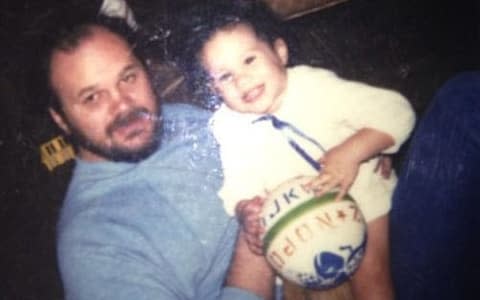 Prince Harry's fiancee Meghan Markle, pictured as a baby with her father Thomas - Credit: TIM STEWART NEWS LIMITED