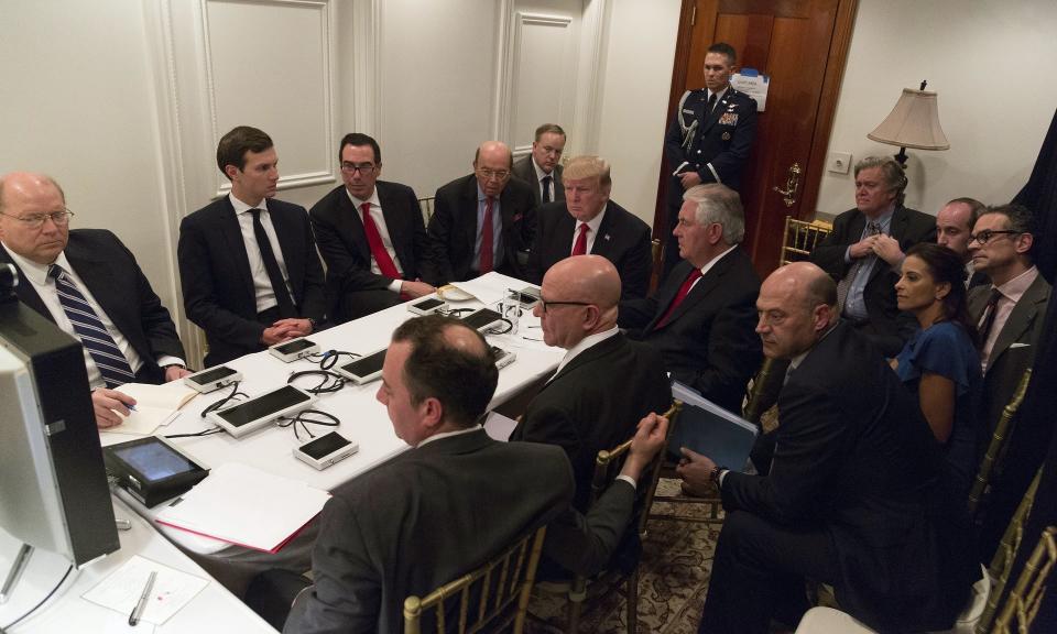 Trump receives a briefing on the Syria military strike from his national security team including a video teleconference with Secretary of Defense Gen. James Mattis and Chairman of the Joint Chiefs of Staff Gen. Joseph Dunford on April 6, 2017, in a secured location at Mar-a-Lago in Palm Beach, Florida.