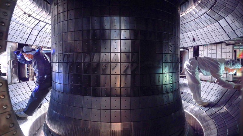 Workers inside the vacuum vessel of the KSTAR tokamak.