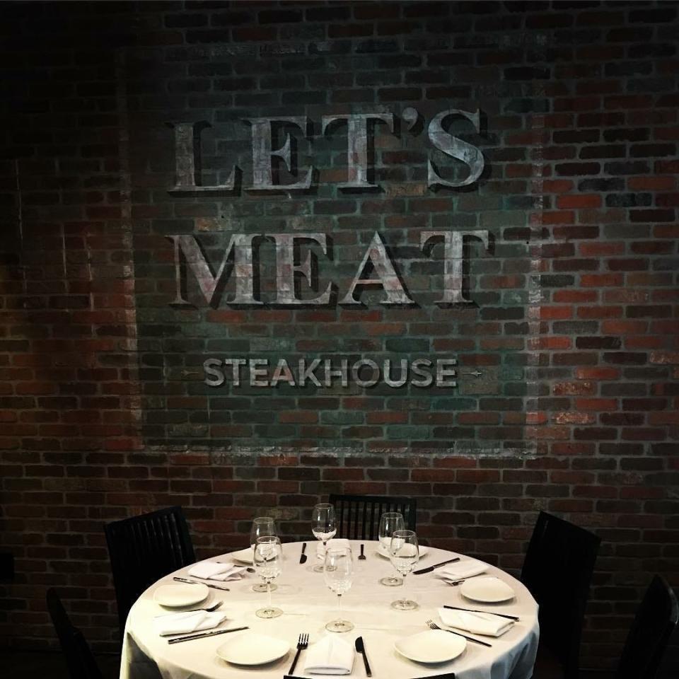 Let's Meat has a painting that looks like an old billboard