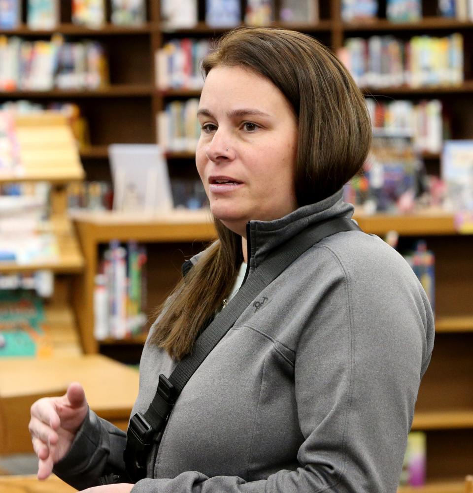 Alicia Alkire former South Bend school teacher with students in the schools, talks Wednesday, Feb. 8, 2023, after the information session for the South Bend school district’s long-range facilities master plan at Clay International Academy in South Bend.