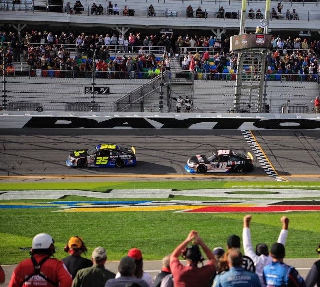 Greg Van Alst leads Connor Mosack across the stripe to win Saturday's ARCA 200-miler at Daytona.