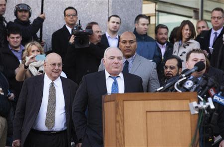 Michael Skakel (C) leaves Superior Court with his attorney Hubert Santos (L) after posting a $1.2 million bail in Stamford, Connecticut November 21, 2013. REUTERS/Michelle McLoughlin