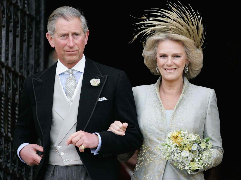 <p>Anwar Hussein/Getty </p> Prince Charles and his wife Camilla at the Service of Prayer and Dedication following their marriage at The Guildhall, at Windsor Castle on April 9, 2005.