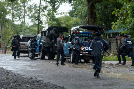 Police forces prepare to patrol in Maungdaw township at Rakhine state, northeast Myanmar, October 12, 2016. REUTERS/Stringer