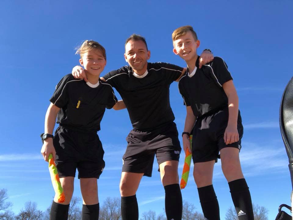 Brian Barlow alongside two youth referees. (Image: Offside via Facebook)