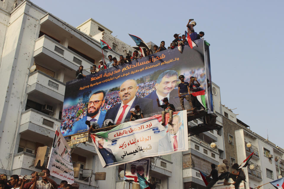 Supporters of southern separatists attend a rally to show support for the United Arab Emirates amid a standoff with the internationally recognized government, in Aden, Yemen, Thursday, Sept. 05, 2019. Yemeni officials say Saudi Arabia is pushing for a settlement between the internationally recognized government and southern separatists backed by the UAE. They said Thursday that Saudi and UAE officials have met separately to agree on a draft agreement before presenting it to President Abed Rabbo Mansour Hadi and the Southern Transitional Council, which took control of Hadi's interim capital of Aden. (AP Photo/Wail al-Qubaty)