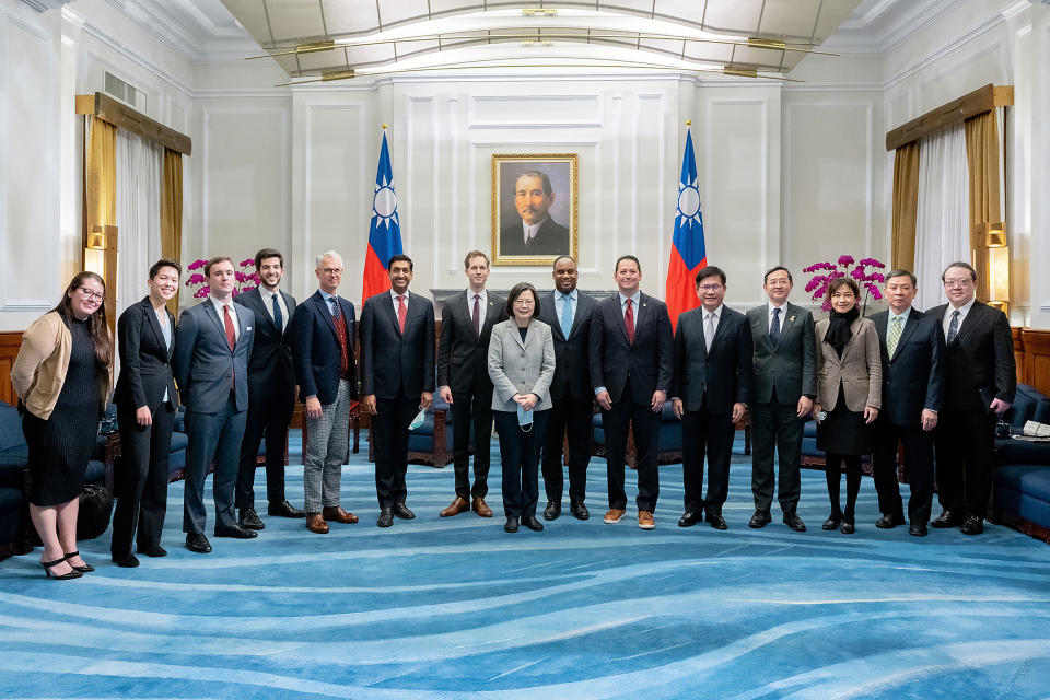 In this photo released by the Taiwan Presidential Office, Taiwan's President Tsai Ing-wen, center, and Taiwanese officials pose for photos with a U.S. delegation led by California Rep. Ro Khanna, sixth from left, during a meeting at the Presidential Office in Taipei, Taiwan on Tuesday, Feb. 21, 2023. A delegation of U.S. lawmakers led by Khanna on Tuesday met with Taiwan's president, who promised to deepen military cooperation between the two sides despite objections from China, which claims the island as its own territory. (Taiwan Presidential Office via AP)