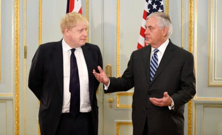 U.S. Secretary of State Rex Tillerson and Britain's Foreign Secretary Boris Johnson attend a press conference in London, January 22, 2018. REUTERS/Toby Melville