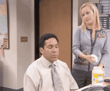 angela slapping mayo on oscar's hair in the office