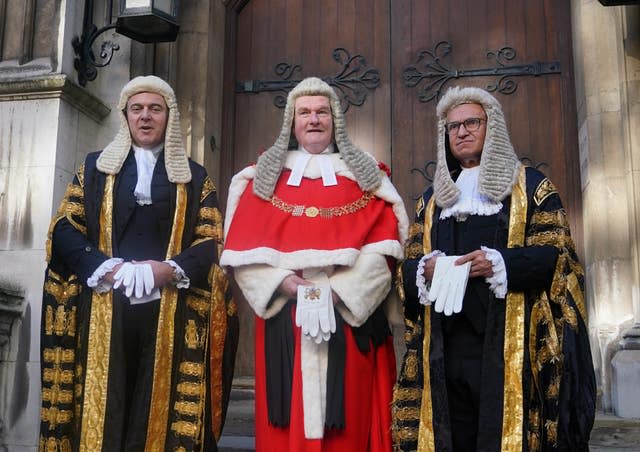 From left, Justice Secretary Brandon Lewis, alongside Lord Chief Justice Lord Burnett and Master of the Rolls Sir Geoffrey Vos, at the Royal Courts of Justice, in central London, ahead of his swearing in ceremony as Lord Chancellor (Yui Mok/PA)
