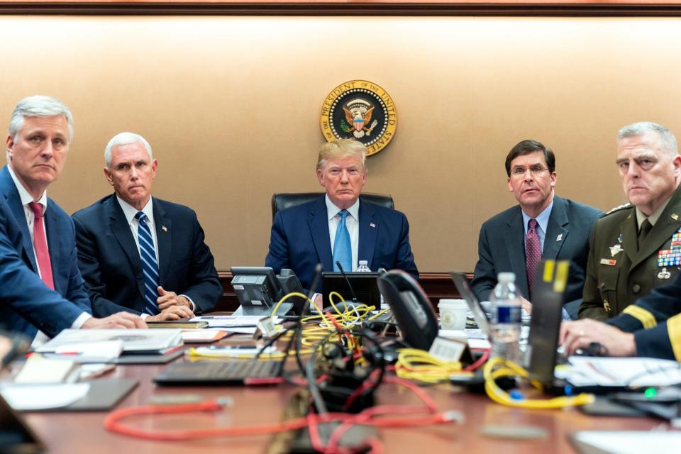 President Donald Trump with, from left, national security adviser Robert O’Brien,  Vice President Mike Pence, Defense Secretary Mark Esper and Army Gen. Mark Milley, chairman of the Joint Chiefs of Staff, in the situation room on Oct. 26, 2019.