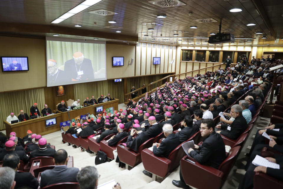 Pope Francis presides over the opening session of the Amazon synod, at the Vatican, Monday, Oct. 7, 2019. Pope Francis opened a three-week meeting on preserving the rainforest and ministering to its native people as he fended off attacks from conservatives who are opposed to his ecological agenda. (AP Photo/Andrew Medichini)