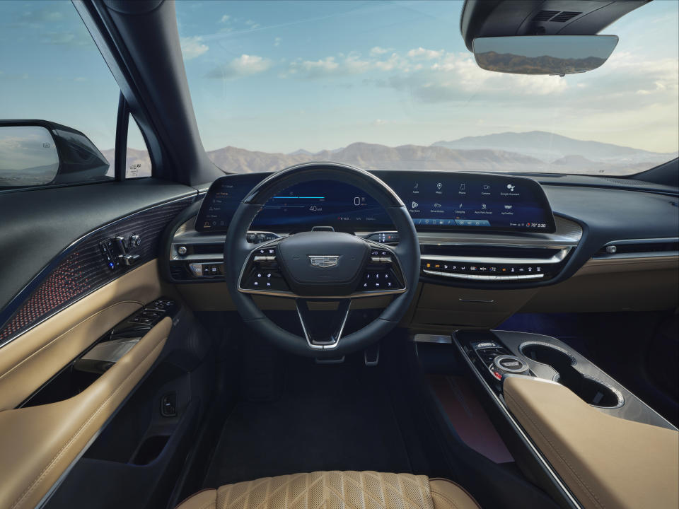 Interior shot of the full dash and center console in the 2025 Cadillac LYRIQ Luxury.