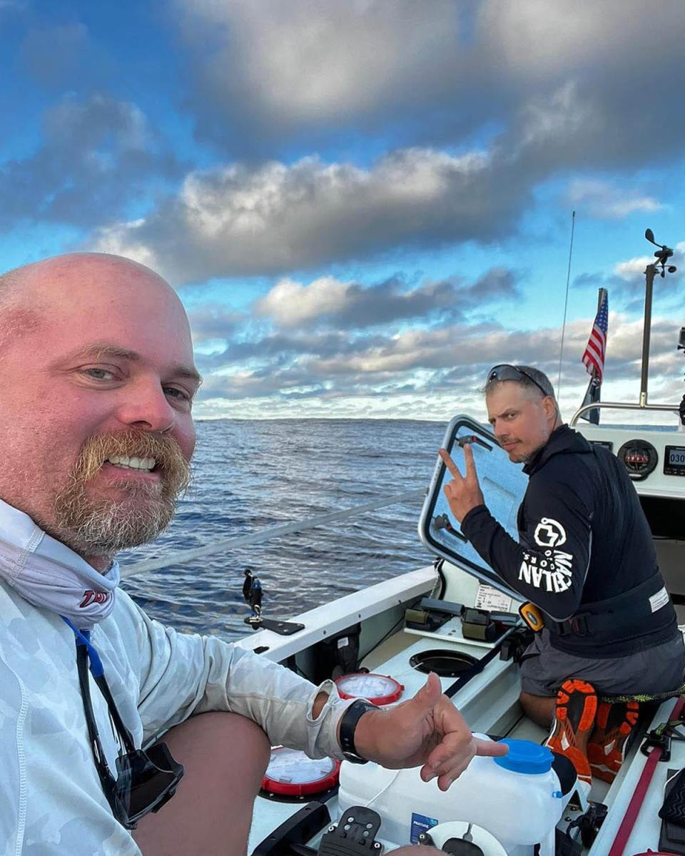 Ben Odom (left) of Texas and Jacksonville-based Mat Steinlin pause on their 3,000-mile row across the Atlantic as part of the 2021 Talisker Whiskey Atlantic Challenge charity race.