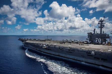 The Nimitz-class U.S. Navy aircraft carrier USS Carl Vinson transits the Philippine Sea while conducting a bilateral exercise with the Japan Maritime Self-Defense Force April 23, 2017. U.S. Navy/Mass Communication Specialist 2nd Class Z.A. Landers/Handout via REUTERS