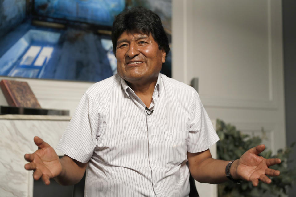 Former Bolivian President Evo Morales speaks during an interview with The Associated Press in Mexico City, Thursday, Nov. 14, 2019. Mexico granted asylum to Morales, who resigned on Nov. 10, under mounting pressure from the military and the public after his re-election victory triggered weeks of fraud allegations and deadly protests. (AP Photo/Eduardo Verdugo)