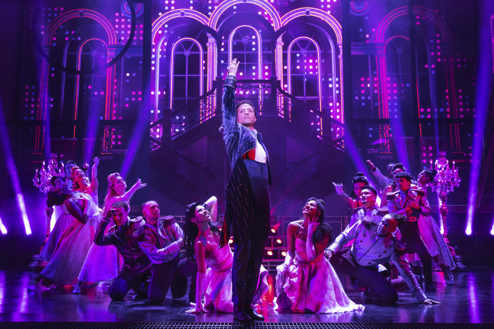 This image released by Vivacity Media Group shows Justin Guarini, center, and the company during a performance of the musical "Once Upon a One More Time." (Matthew Murphy/Vivacity Media Group via AP)