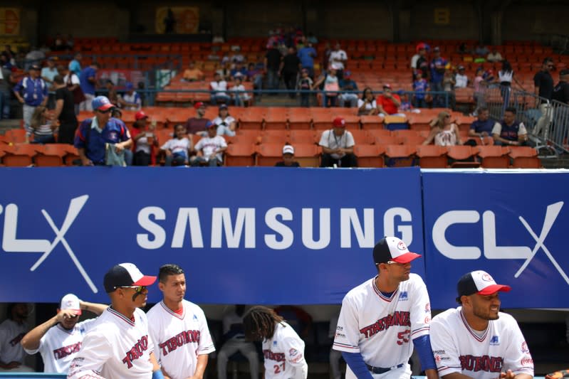 Players of Tiburones de la Guaira team, prepare before a match at University Stadium in Caracas