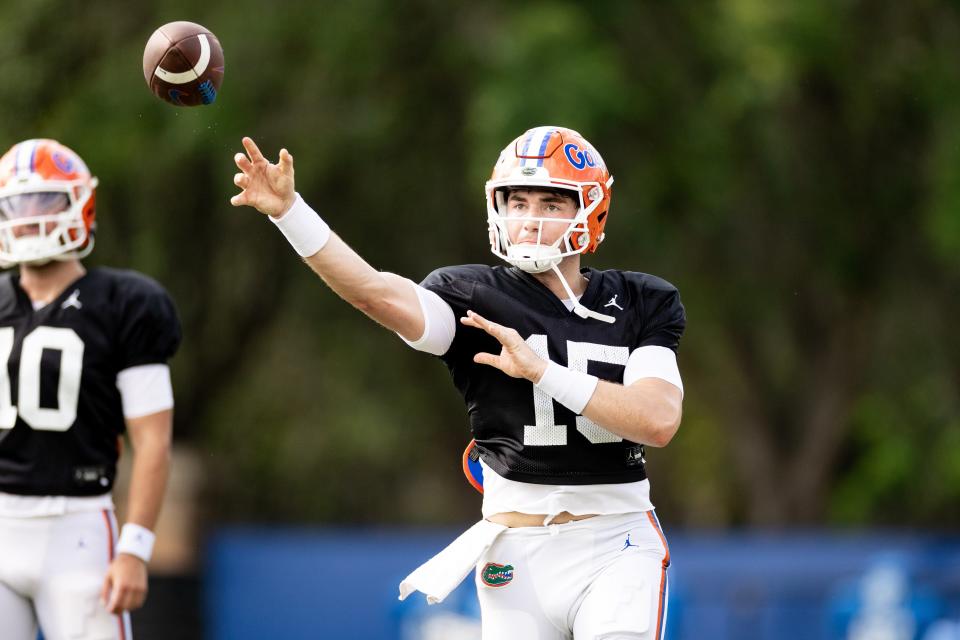 Florida Gators quarterback Graham Mertz (15) throws the ball during spring practice at Sanders Outdoor Practice Fields in Gainesville on Tuesday.