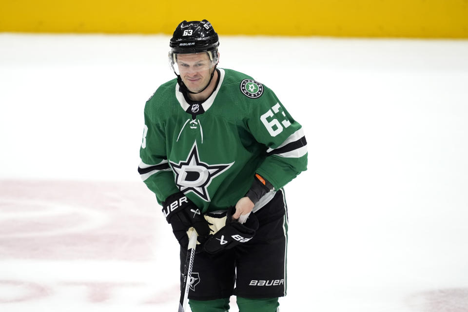 Dallas Stars right wing Evgenii Dadonov skates to the penalty box after being issued a penalty for tripping in the first period of an NHL hockey game against the St. Louis Blues in Dallas, Wednesday, April 17, 2024. The game was Dadonov's first since returning from injury. (AP Photo/Tony Gutierrez)