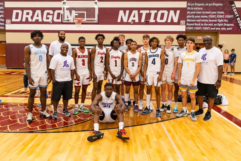 The Austin all-star basketball team gets together after the Jordan Clarkson All Star Weekend seniors game on Saturday. The San Antonio area All-Stars defeated the Austin area All-Stars 130-118 at Round Rock High School.