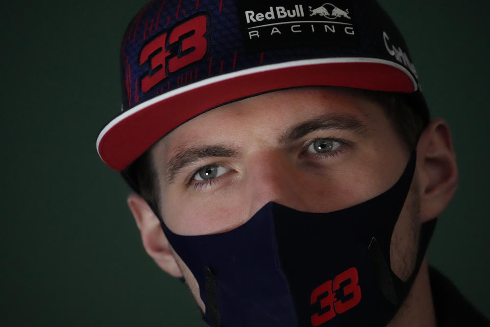 Red Bull driver Max Verstappen of the Netherlands talks to a reporter at the Losail International Circuit in Losail, Qatar, Thursday, Nov. 18, 2021 ahead of the Qatar Formula One Grand Prix. (AP Photo/Darko Bandic)