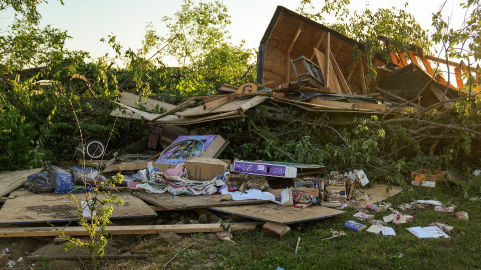 Debris is left behind after a reported tornado touched down in several areas of Greenwood, Indiana, near Bargersville, Sunday. - Jenna Watson/The Indianapolis Star/AP