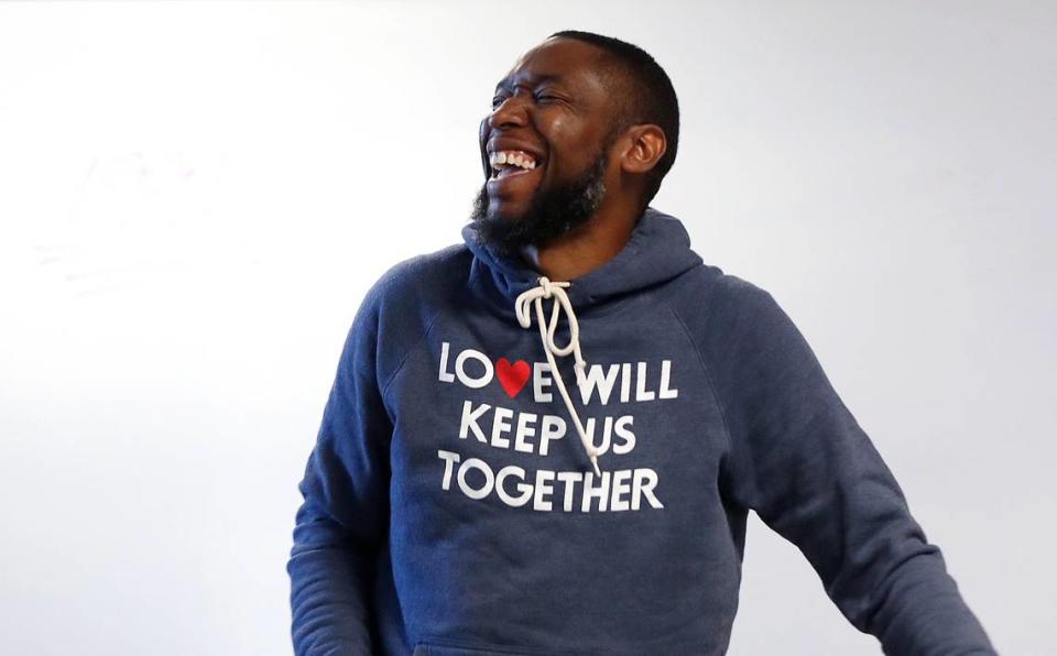 Patrick Douthit, better know as 9th Wonder, laughs as he talks with students while teaching the History of Hip Hop at North Carolina Central University in Durham, N.C., Thursday, October 24, 2019.