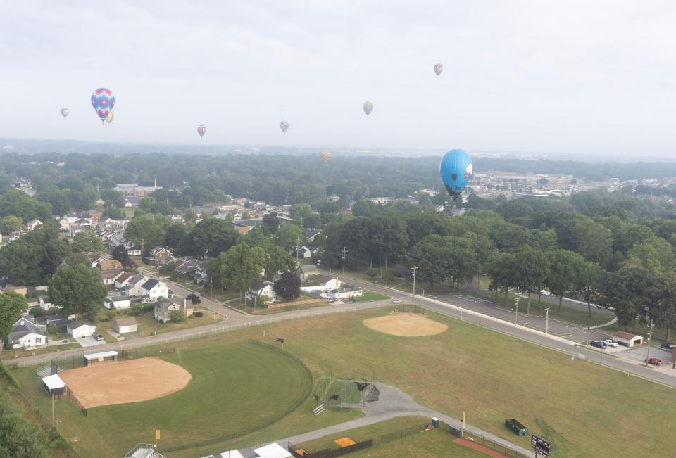 Balloons float over North Canton during the media/sponsor flight Friday morning.