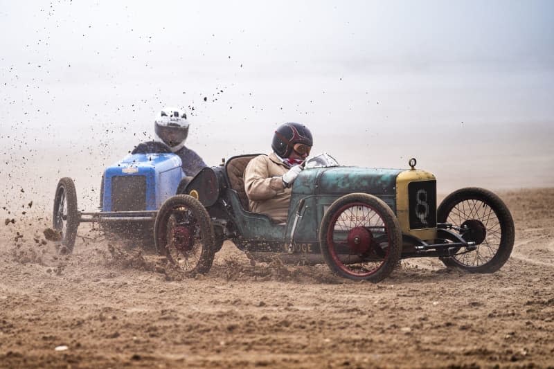 Vintage vehicles are seen during Race The Waves 2024 on Bridlington's South beach in Yorkshire. Danny Lawson/PA Wire/dpa