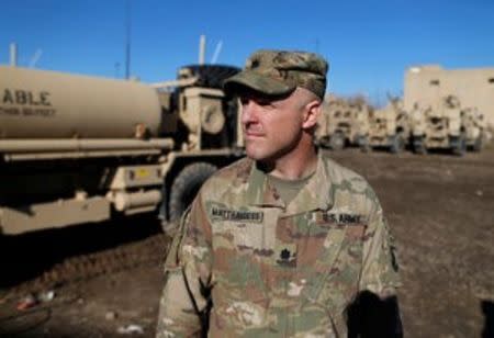 A member of US army speaks during an intrview with Reuters in the town of Bartella, east of Mosul, Iraq, December 27, 2016. Picture taken December 27, 2016. REUTERS/Ammar Awad