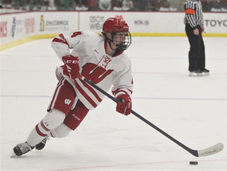 Wisconsin's Caroline Harvey attacks in the goal during the first period of the team's game with St. Cloud State at LaBahn Arena in Madison on Feb. 4.