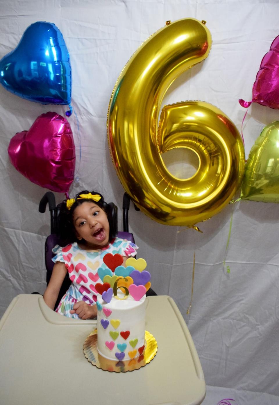 Darah Girón Funes, the first child born in the continental U.S. with the effects of Zika virus, celebrates her sixth birthday at her home in Bayonne, N.J., on May 31, 2022.