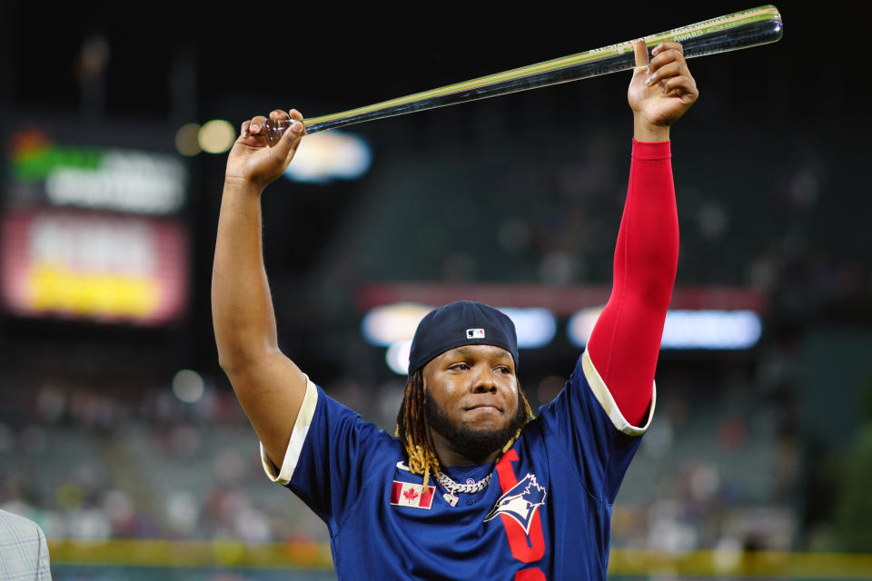 Vladimir Guerrero Jr. celebrates after winning the MVP award at the All-Star Game.