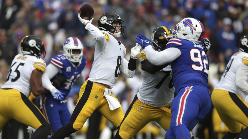 Pittsburgh Steelers quarterback Kenny Pickett (8) throws a pass during the second half of an NFL football game against the Buffalo Bills in Orchard Park, N.Y., Sunday, Oct. 9, 2022. The Bills won 38-3. (AP Photo/Joshua Bessex)