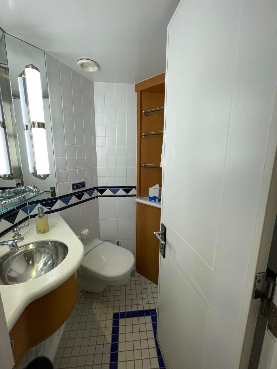 interior shot of the bathroom on a deluxe interior stateroom on a disney magic cruise ship