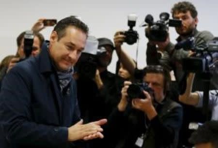 Head of the Austrian Freedom Party (FPOe) Heinz-Christian Strache arrives at a polling station during regional elections in Vienna, Austria, October 11, 2015. REUTERS/Leonhard Foeger