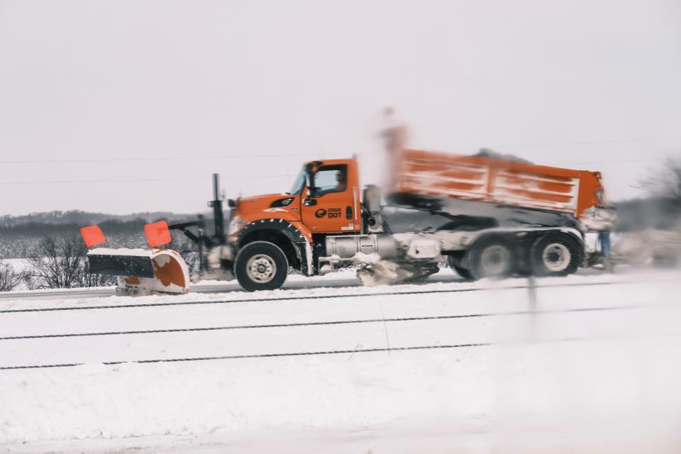 A snow plow clears the roadway on Interstate 80 in eastern Iowa on Saturday, Jan. 13, 2024. Heavy snow and high winds led the National weather service to issue a blizzard warning for much of the state of Iowa. (Nick Rohlman /The Gazette via AP) ORG XMIT: IACED604