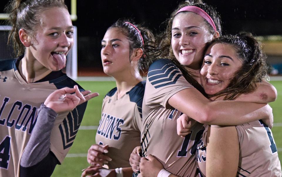 The Saint Stephen's Episcopal girls varsity soccer team, including Annabelle Pullen, Ava Foy, Julia Villaveces and Sofia Diaz, on right, celebrate their win over Imagine School at North Port Tuesday night in a Class 2A-Region 3 region quarterfinal match at the Moore Athletic Complex at Turner Fields in Bradenton.